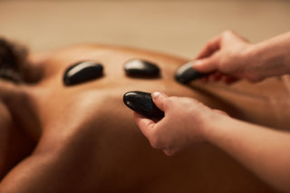 15% rabais Massage aux pierres ancestrales chaudes